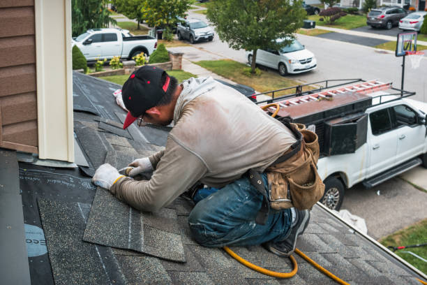Professional Roofing technician working in Cadillac, MI
